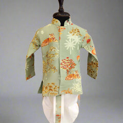 A printed green kurta with animal patterns accompanied by a white dhoti, displayed on a mannequin.