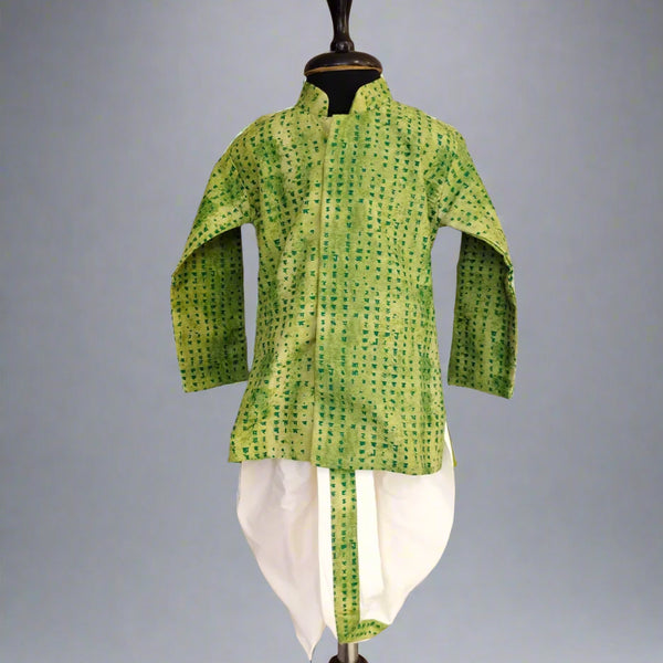 A green and white dotted dhoti-kurta set for boys displayed on a mannequin.