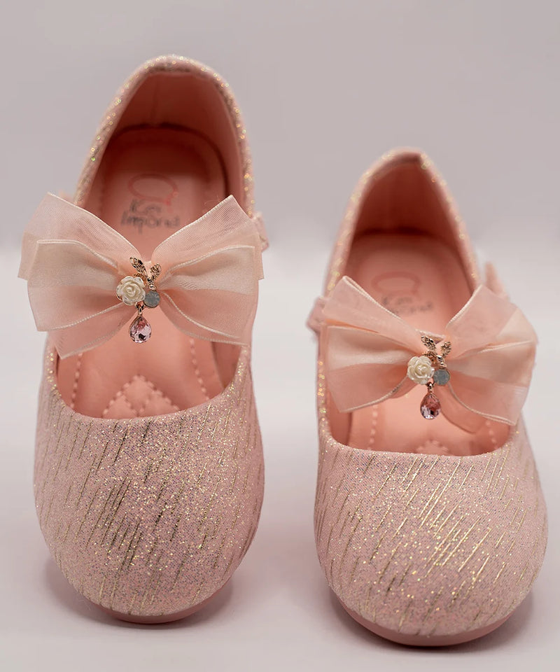 Infant girls’ pink glitter slip-on shoes with organza bow and floral embellishment, Jaipur
