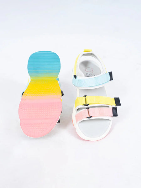 Close-up of trendy girls' summer sandals with pastel straps and cushioned sole, Jaipur

