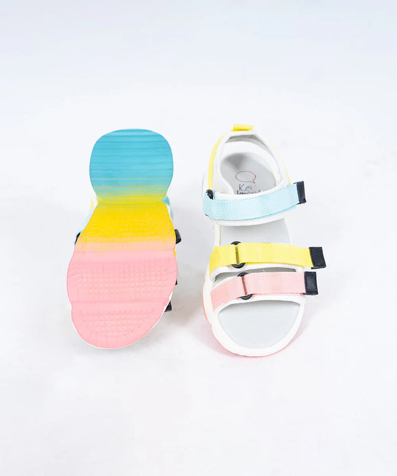 Close-up of trendy girls' summer sandals with pastel straps and cushioned sole, Jaipur


