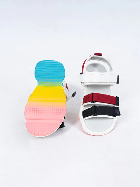 Close-up of trendy girls' summer sandals with white sole and colorblock design, Jaipur