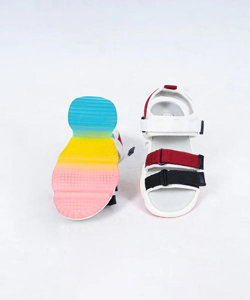 Close-up of trendy girls' summer sandals with white sole and colorblock design, Jaipur