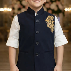Child wearing a navy vest with gold embroidery in an indoor setting