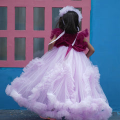 Fancy frill gown with matching hair accessory, Jaipur kidswear showroom