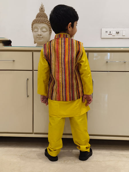 This is back look of yellow kurta pajama with multi color strip jacket
