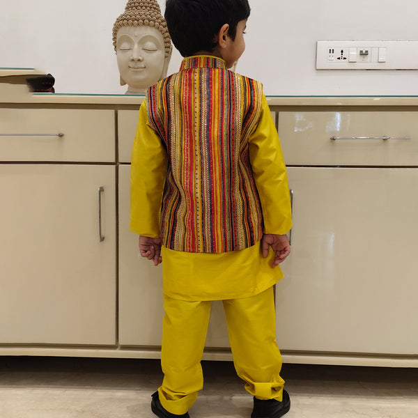 This is back look of yellow kurta pajama with multi color strip jacket