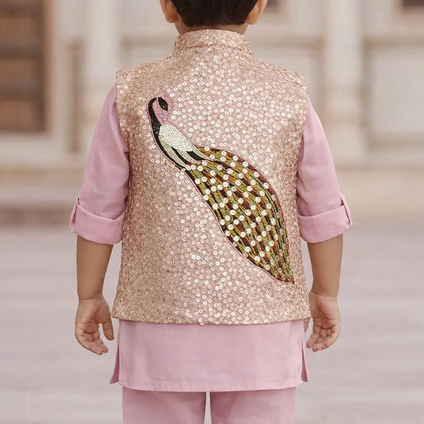 Child wearing a traditional outfit with a sequined vest and pink shirt and pants.