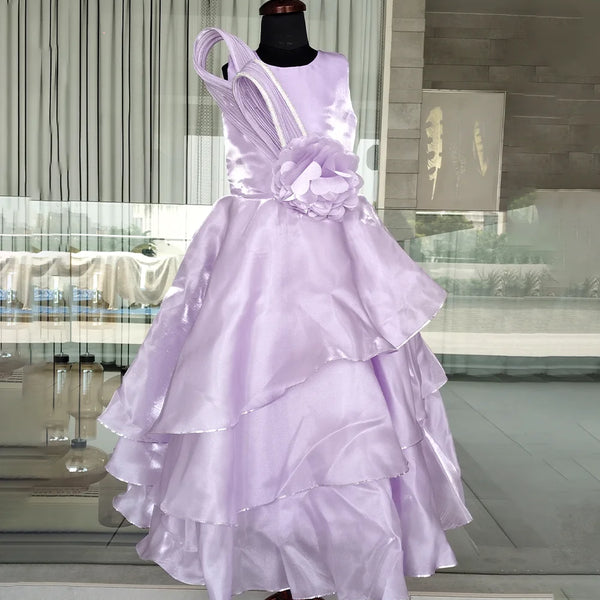 Lavender dress on a mannequin in a modern interior setting