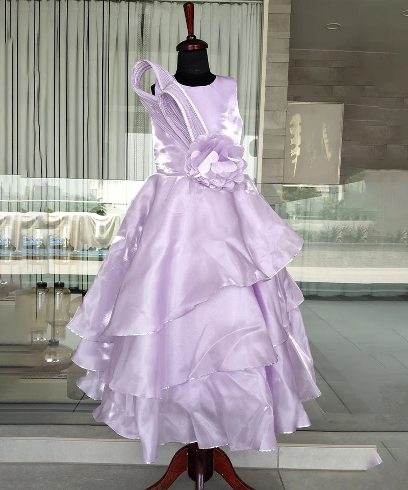 Lavender dress on a mannequin in a modern interior setting