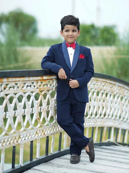 An elegant Suit set that comes with a blue coat, white shirt and blue pants perfect for every formal occasion. This top-line quality suit set is paired with a beautiful red coloured bow and a pocket square.