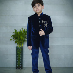 Navy velvet Jodhpuri bandhgala suit for boys with deer detailing, Jaipur
