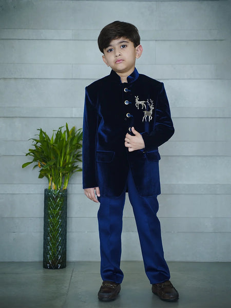 Navy velvet Jodhpuri bandhgala suit for boys with deer detailing, Jaipur