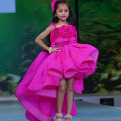 Neon pink party dress for girls with big floral detail and up-and-down hemline, Jaipur