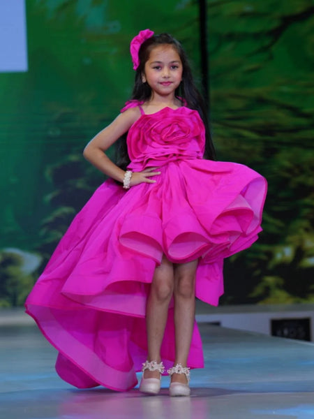 Neon pink party dress for girls with big floral detail and up-and-down hemline, Jaipur