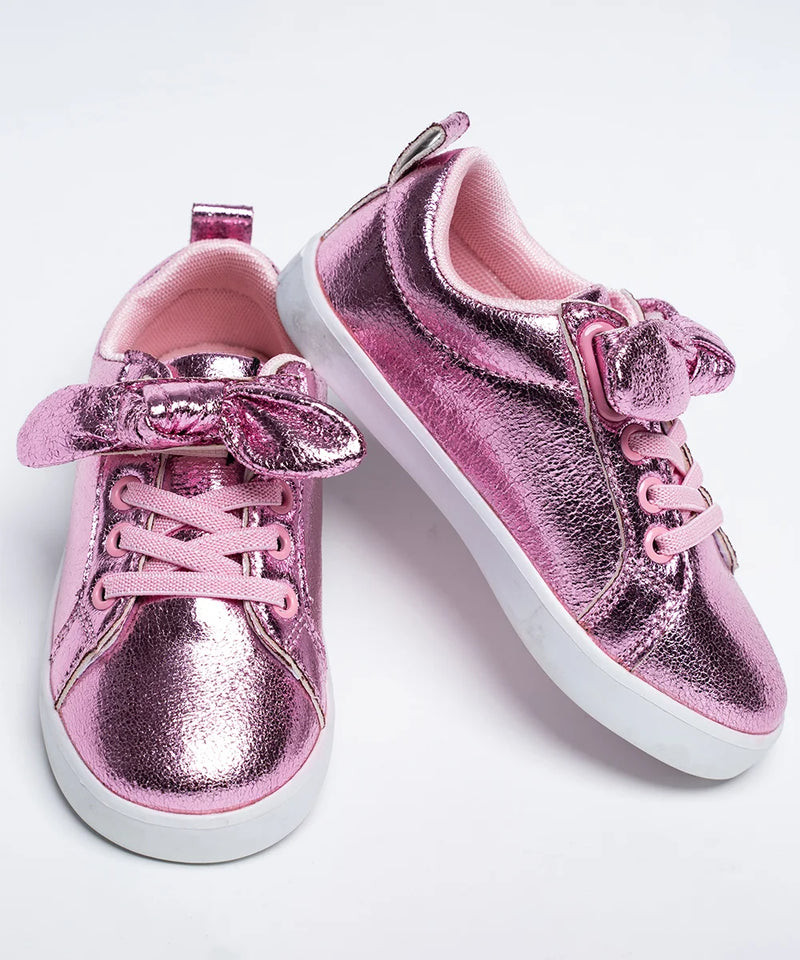 Shiny pink lace-up party shoes for girls featuring statement bow detail, Jaipur