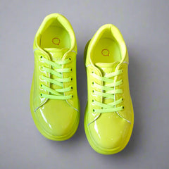 Close-up of fluorescent lime sports sneakers for girls, perfect for active play in Jaipur