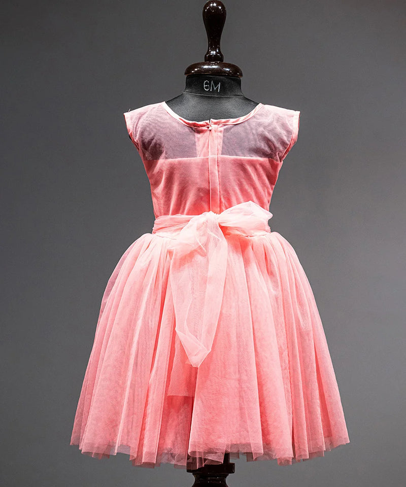 back view of peach frock for baby girls 
