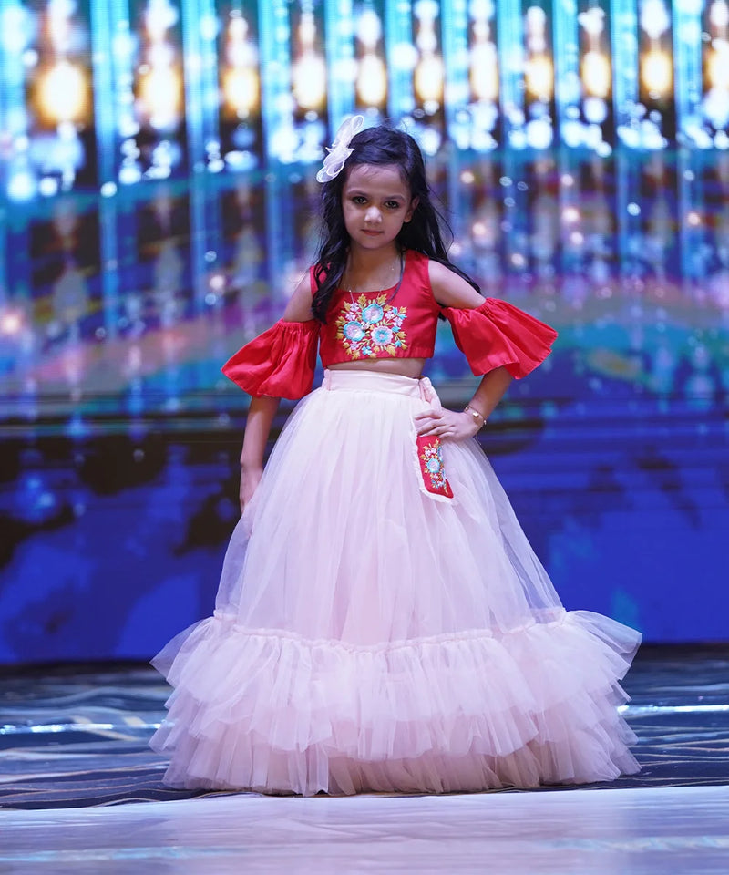 Peach pink net lehenga with floral embroidered blouse, best wedding lehenga for kids in Jaipur

 