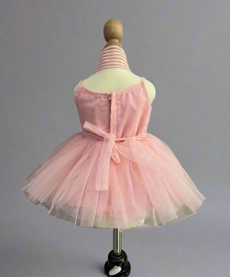 back view of peach frock for baby girls 