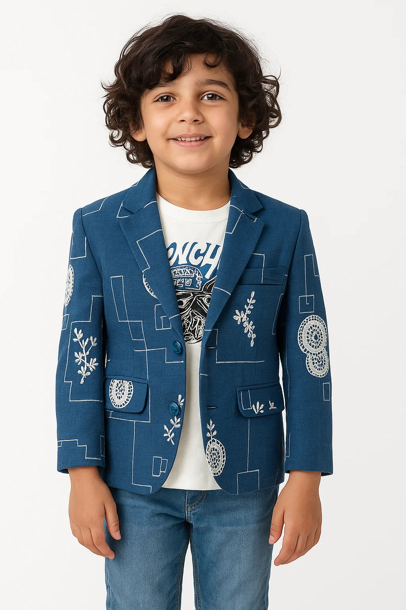 Child wearing a blue patterned blazer over a white shirt with text on a white background