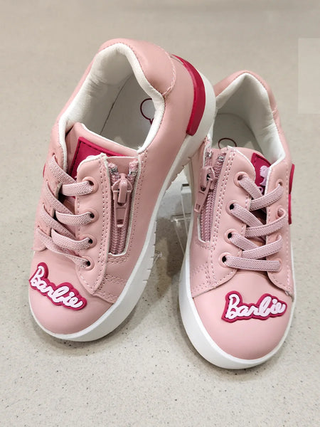Pink sneakers with 'Barbie' logo on a light gray background
