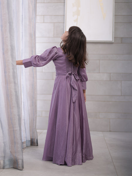 back view of purple shimmer gown for girls 