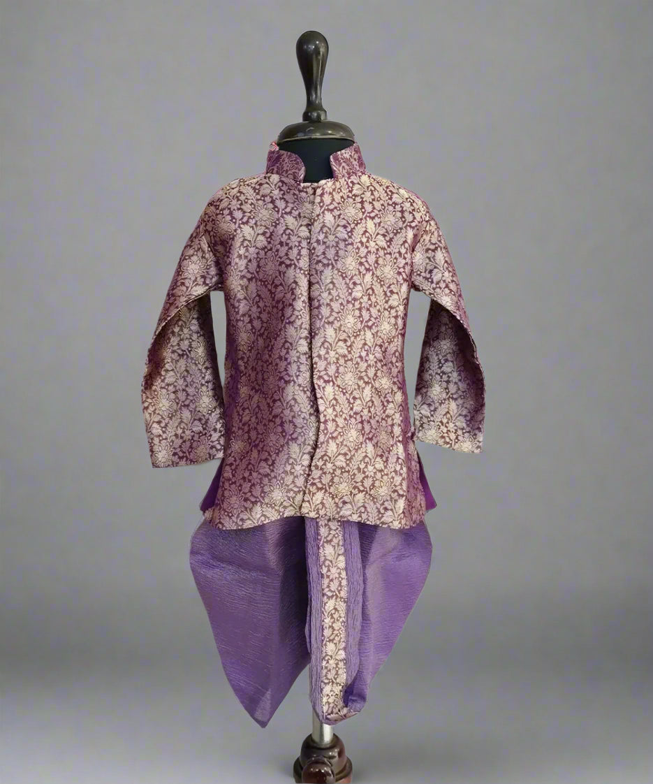 A purple colored dhoti-kurta set for boys displayed on a mannequin.