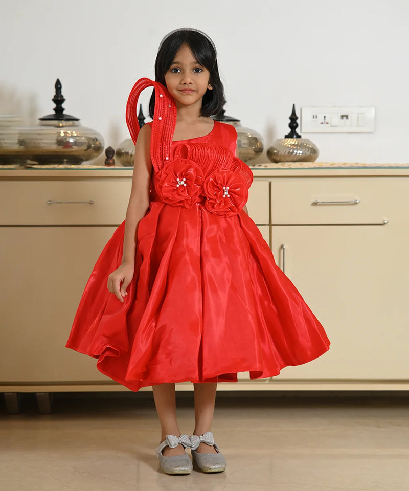 Red designer birthday frock for girls with floral waist detail, Jaipur kidswear showroom

