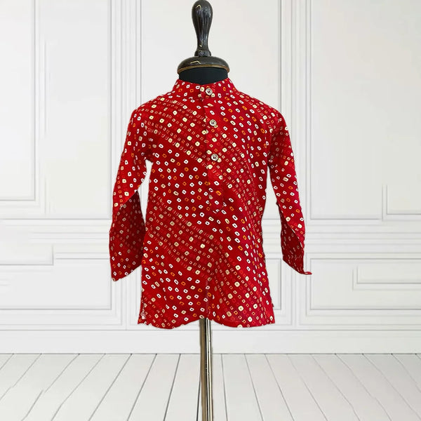 It is a red and white coloured smart Bhandej print kurta Pyjama set that creates a spotlight of its own. Buy kid's kurtas online for boys between 6 months to 14 years of age.