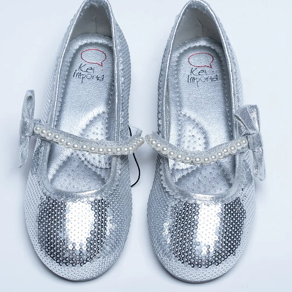 It's a pair of silver sequin work sandals with a round-toe. It features pearl detailing and Patterned synthetic outsole.