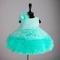 Sea-blue birthday frock for girls with floral shoulder detail, Jaipur kidswear showroom