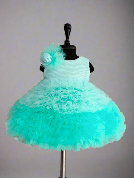 Sea-blue birthday frock for girls with floral shoulder detail, Jaipur kidswear showroom