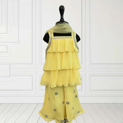 Infant yellow sharara set with lace kurta and sequin pants, best wedding kidswear in Jaipur