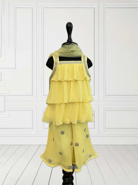 Infant yellow sharara set with lace kurta and sequin pants, best wedding kidswear in Jaipur