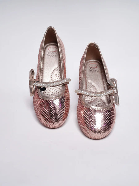 Kids' sparkling pink party shoes featuring pearl-embellished band and glitter finish, Jaipur