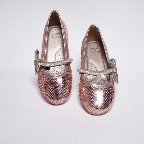 Kids' sparkling pink party shoes featuring pearl-embellished band and glitter finish, Jaipur