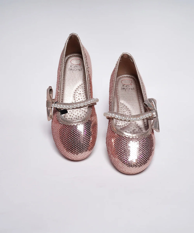 Kids' sparkling pink party shoes featuring pearl-embellished band and glitter finish, Jaipur