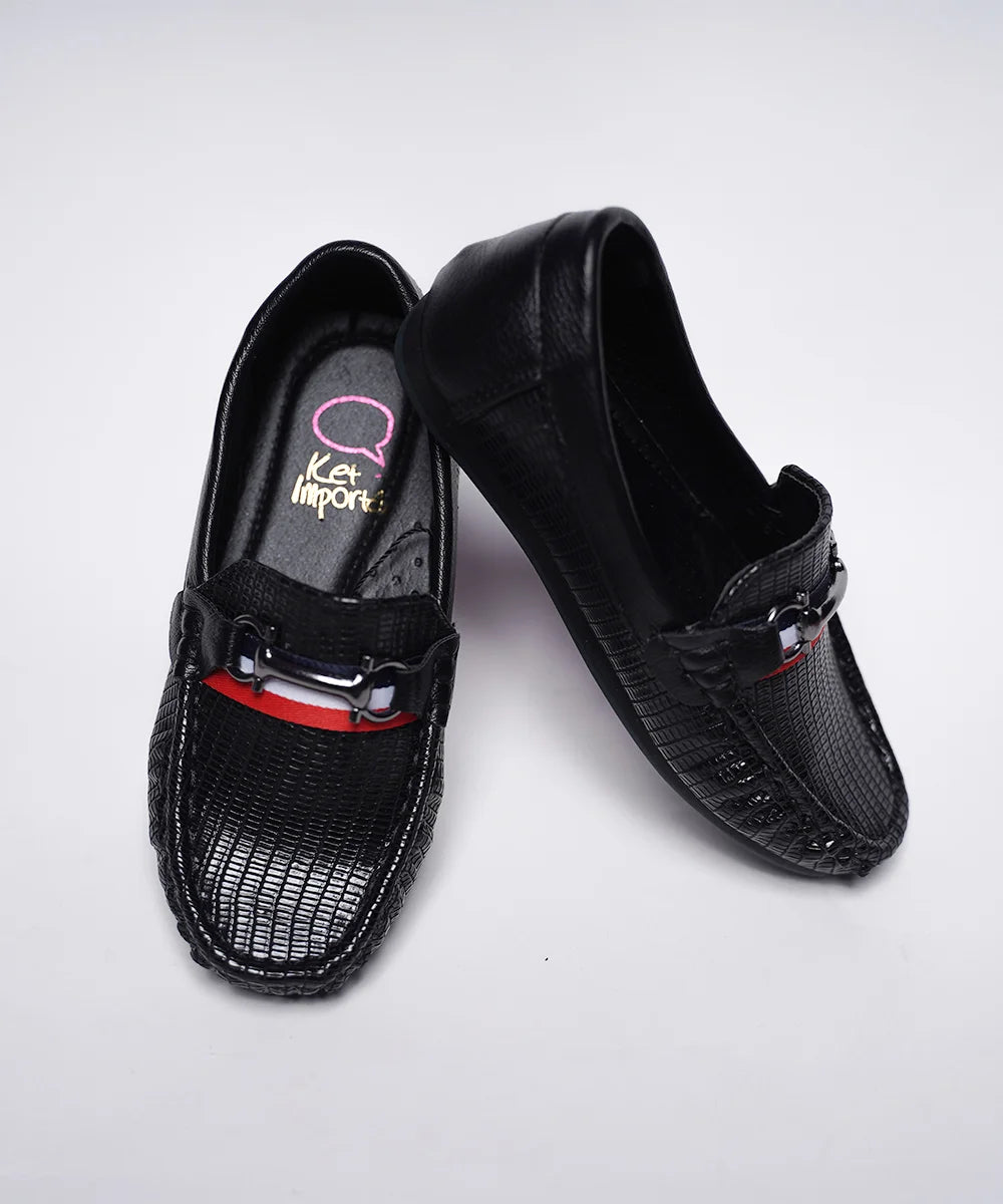 It's a pair of black colour-blocked round-toed formal loafers for kids boys.