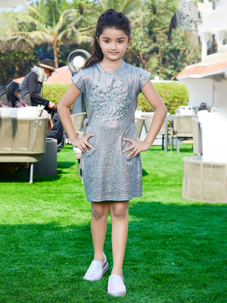 It is a grey Colored party dress for baby girls that comes with a matching Inner and is the best children's birthday dress. It features a big floral applique work in the middle of the dress.