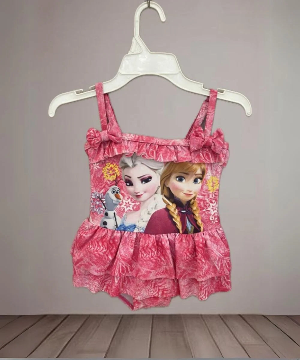 It's a pink Colored Disney princess-printed swimsuit for little girls with a bow and frill detailing.