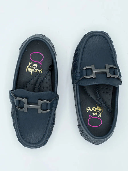 Close-up of trendy kids' navy blue moccasins with cushioned insole and basket-weave pattern, Jaipur

