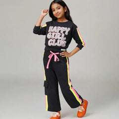 Girl wearing a black 'Happy Girl Club' outfit with colorful accents on a gray background
