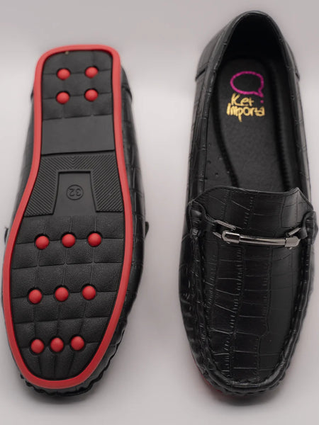 Close-up of trendy kids' black party loafers with cushioned insole and embossed finish, Jaipur
