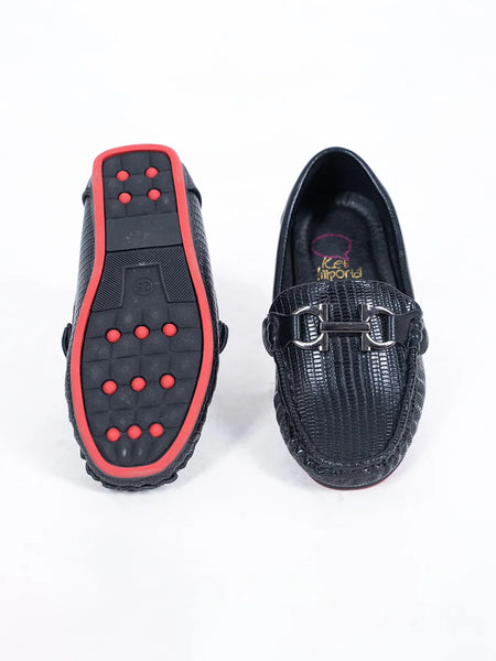 Close-up of trendy kids' black party moccasins with cushioned insole and woven pattern, Jaipur

