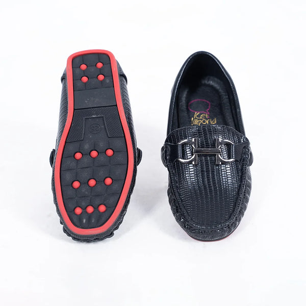 Close-up of trendy kids' black party moccasins with cushioned insole and woven pattern, Jaipur

