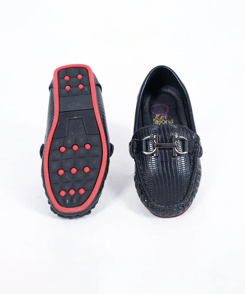 Close-up of trendy kids' black party moccasins with cushioned insole and woven pattern, Jaipur

