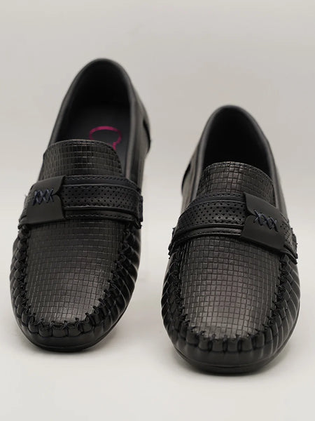 Close-up of trendy kids' black loafers with woven finish and flexible sole, Jaipur