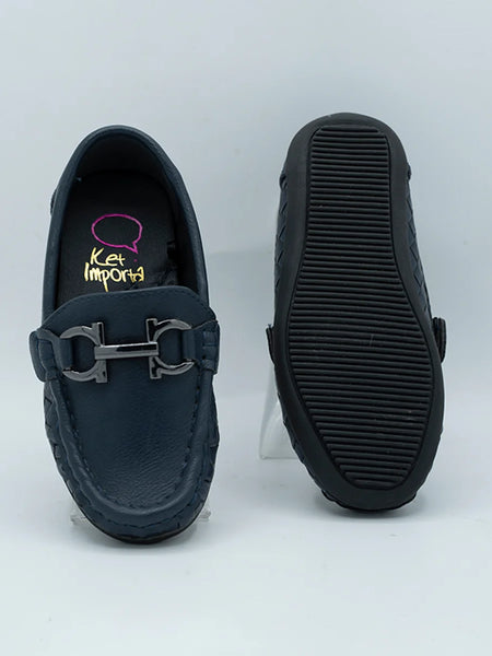Close-up of trendy kids' navy blue moccasins with cushioned insole and basket-weave pattern, Jaipur