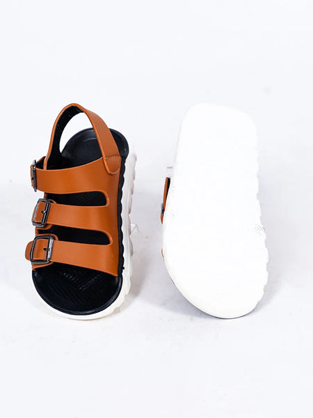 Close-up of trendy tan open-toe sandals for boys with metal buckles, Jaipur